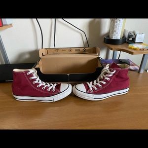 Maroon high-top converse